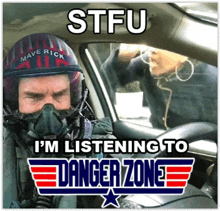 a man wearing a helmet that says maverick on it is listening to danger zone