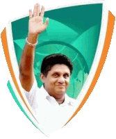 a man is waving his hand in front of a green and orange shield .