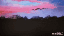 a painting of a sunset with the words made in animatica on the bottom