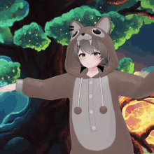 a girl in a squirrel costume has her arms outstretched in front of a tree