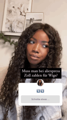 a woman with curly hair has a question in german