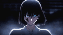 a girl with blue eyes and blood on her face looks at the camera