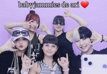 a group of young people are posing for a picture and the caption says babyjammies de ari