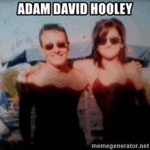 a man and a woman are posing for a picture with the caption adam david hooley