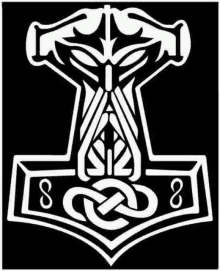 a black and white drawing of a hammer with a celtic design on it .