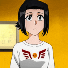 a girl with short black hair is wearing a white shirt with a smiley face on it