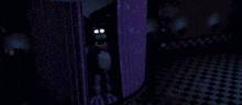 a purple bunny is standing in a dark room