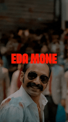 a man with a mustache wearing sunglasses and the name eda mone on the bottom