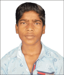 a young man wearing a blue shirt with a pocket that says fashion