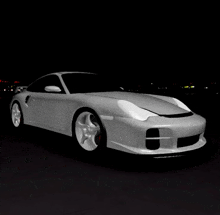 a white sports car with a black background