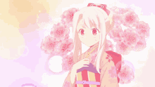 a girl in a kimono is standing in front of a bunch of pink flowers