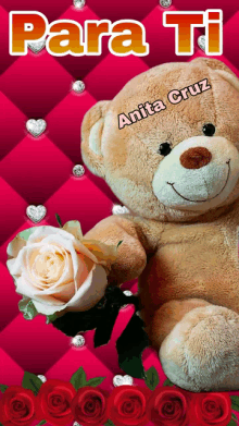 an anita cruz teddy bear holding a rose