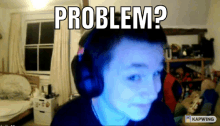 a man wearing headphones is looking at the camera and the caption reads problem