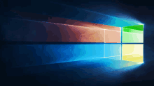 a windows logo that has a rainbow of colors on it