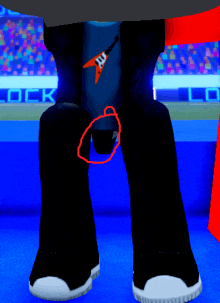 a person 's legs are shown with a red circle around their knee