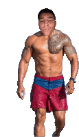 a shirtless man with a tattoo on his chest is wearing a watch