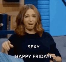 a woman is sitting on a couch with her mouth open and saying `` sexy happy friday '' .