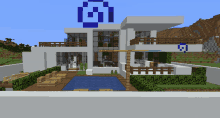 a minecraft house with a blue g on the top