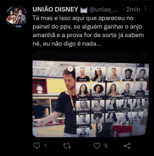 a twitter post from união disney shows a man standing in front of a group of people