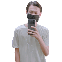 a man wearing a mask takes a picture of himself on his phone