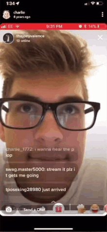 a man wearing glasses is on a live stream on his phone