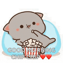 a cartoon cat is eating popcorn with the words good morning chip chip written below it