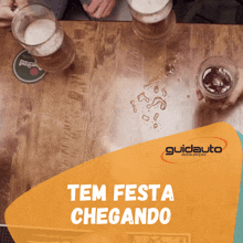 a poster for guidauto auto peças shows a table with beer glasses on it