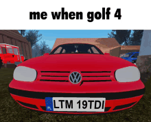 a red volkswagen with a license plate ltm 19tdi