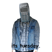 a man wearing a denim jacket has a cell phone on his head and the words it 's tuesday below him