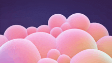 a bunch of pink bubbles floating in the air