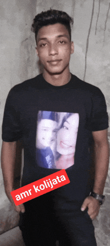 a man wearing a t-shirt with a picture of a man and a woman on it