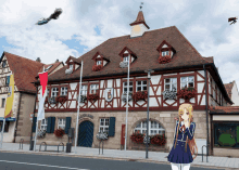 a woman stands in front of a building that says ' stadt ' on it