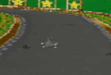 a blurred image of a video game with a cartoon character on a road .