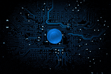 a blue coin that says ' microsoft ' on it is in the middle of a circuit board