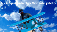 a man in a sheriff uniform is flying a blue plane