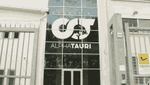 a building with a sign that says alphatauri