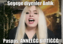 a woman with blonde hair is making a funny face with the caption segege diyenler anlik paspas anneegg bittigg