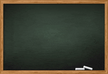 a blackboard with two pieces of chalk on it .