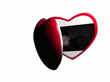 a heart shaped mirror has a picture of a man on it