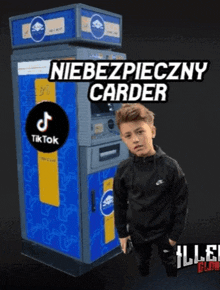 a boy standing in front of an atm that says niebezpieczny carder on it