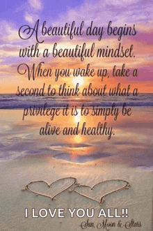 a beautiful day begins with a beautiful mindset written on a beach