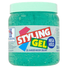 a jar of styling gel with a green cap