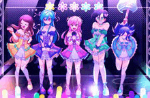 a group of anime girls are standing next to each other on a stage and singing into microphones .