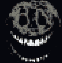 a pixel art drawing of a skull with a smile on its face