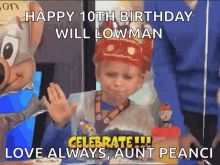 a young boy wearing a red crown is sitting at a table with a birthday cake and a chipotle mascot behind him