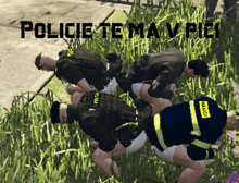 a group of police officers laying in the grass with the words policie te ma v pici