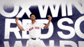 a man in a red sox jersey is dancing in front of a banner that says ox win red sox