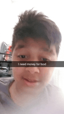 a young man with a snapchat caption that says i need money for food