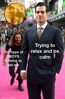 a man in a suit and tie is standing on a pink carpet with a coin that says the boys on it