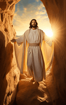 a man in a white robe is walking through a cave